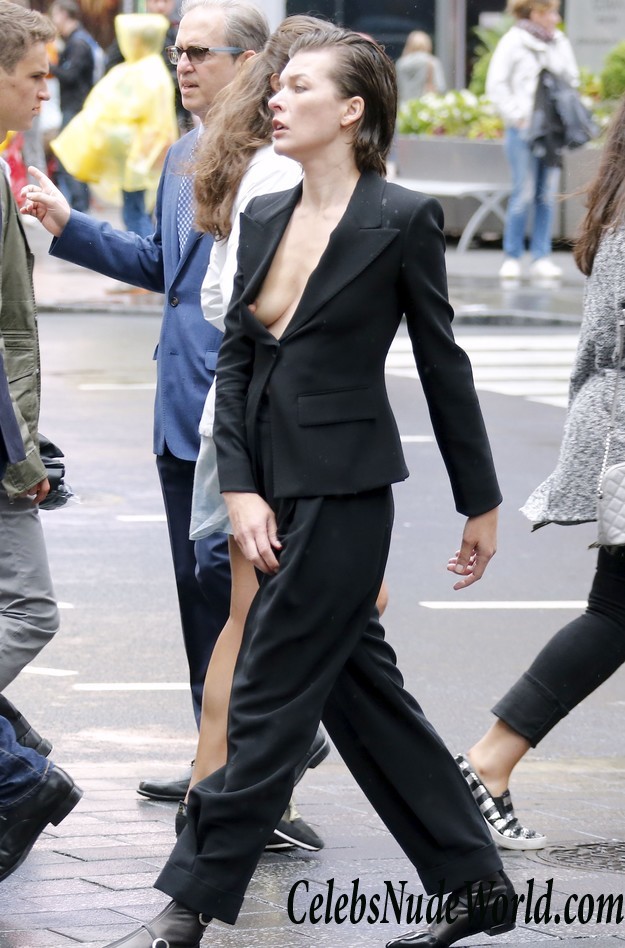 Milla Jovovich Nipple Slip While On A Photo Shoot For Vogue Magazine 22203