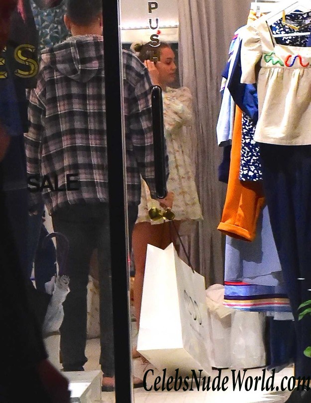 Miley Cyrus Flashes Tits In A Fishnet Top While Shopping In SoHo 23393