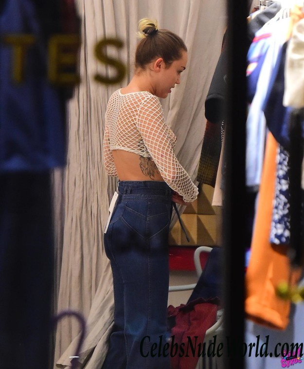 Miley Cyrus Flashes Tits In A Fishnet Top While Shopping In SoHo 23394