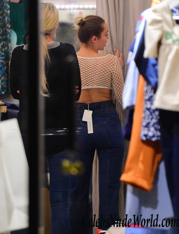 Miley Cyrus Flashes Tits In A Fishnet Top While Shopping In SoHo 23396