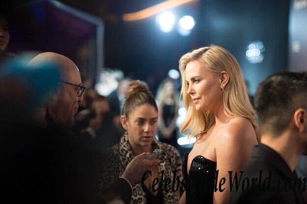 Charlize Theron Rocking a Black Dress with No Bra 58462
