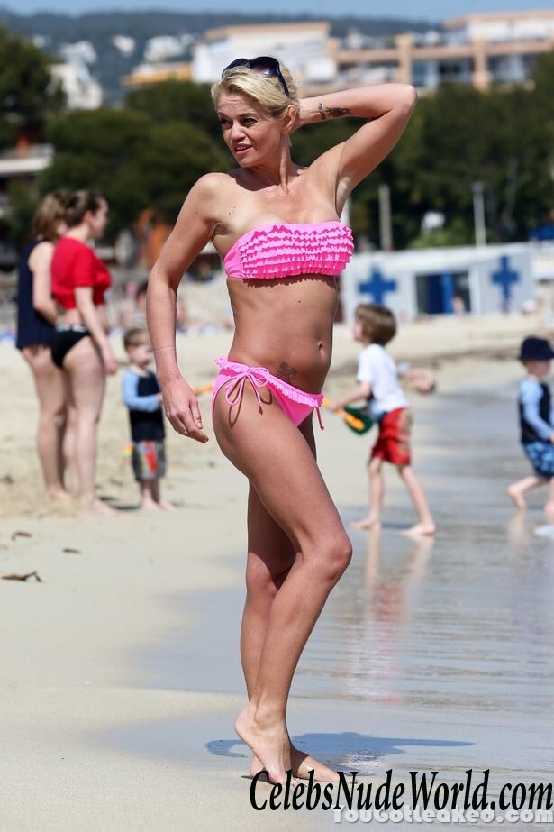 DANNIELLA WESTBROOK topless on a beach 69752