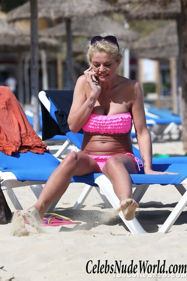 DANNIELLA WESTBROOK topless on a beach 69758