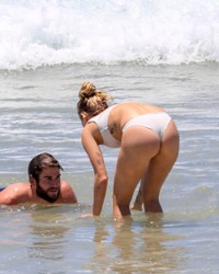 Miley Cyrus Wearing A Thong Bikini On A Beach In Australia