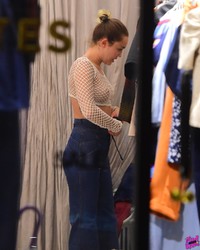 Miley Cyrus Flashes Tits In A Fishnet Top While Shopping In SoHo