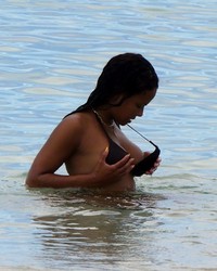 Christina Milian Nip Slip While Adjusting Bikini Top In Miami