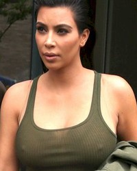 Kim Kardashian Nipple Pokes In A Green Dress