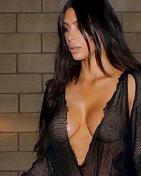 Kim Kardashian Braless In Sheer Top