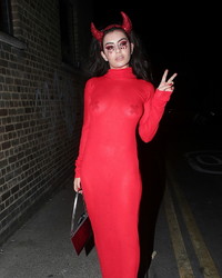 Charli XCX In A Red See Through Dress At Veuve Clicquot Widow Series “ROOMS” In London