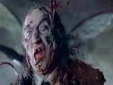 Anna Falchi Big boobs , Horror in Cemetery Man (1994) 14