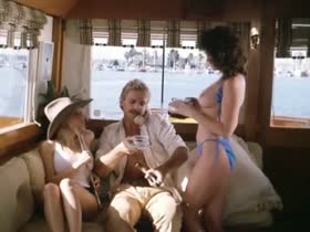 Barbara Edwards ,Kimberly Mcarthur nude in Malibu Express (1985) 4