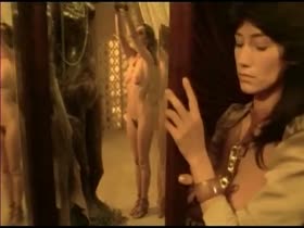 Corinne Clery nude , boobs scene in The Story of O (1975) 1