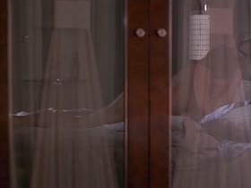 Kate Vernon strip , boobs scene in Dangerous Touch (1994)  20
