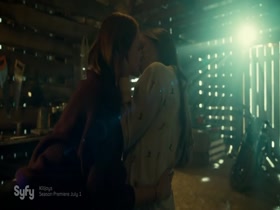 Dominique Provost-Chalkley & Katherine Barrell kissing, Lesbian in Wynonna Earp 15