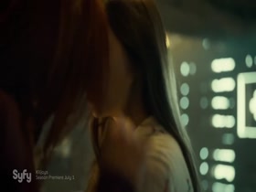 Dominique Provost-Chalkley & Katherine Barrell kissing, Lesbian in Wynonna Earp 17