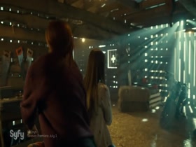 Dominique Provost-Chalkley & Katherine Barrell kissing, Lesbian in Wynonna Earp 2