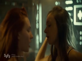 Dominique Provost-Chalkley & Katherine Barrell kissing, Lesbian in Wynonna Earp 20