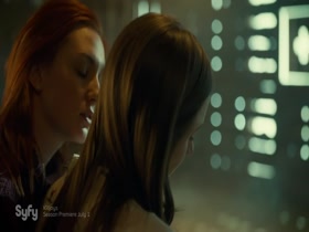 Dominique Provost-Chalkley & Katherine Barrell kissing, Lesbian in Wynonna Earp 5