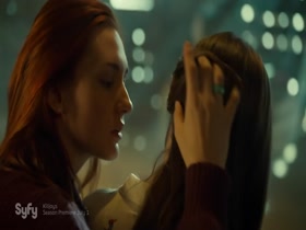 Dominique Provost-Chalkley & Katherine Barrell kissing, Lesbian in Wynonna Earp 7