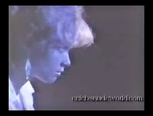 Lauren Holly in Band of the Hand (1986) 20