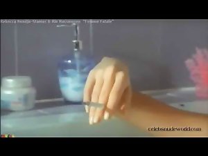 Rebecca Romijn Bathtub , Blonde in Femme Fatale (2002) 7