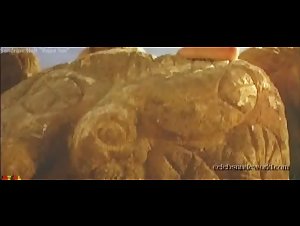 Sandrine Holt Costume , boobs scene in Rapa Nui (1994) 6