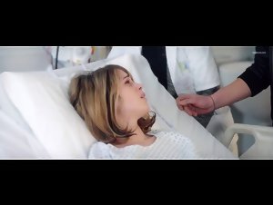 Alice Isaaz boobs scene in Elle (2016) 2