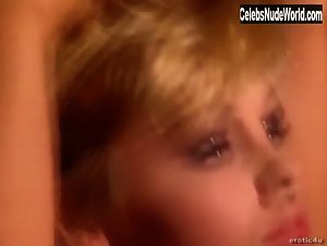 Pamela Anderson Cleavage , Blonde in Playboy: The Very Best of Pamela Anderson (1998) 9