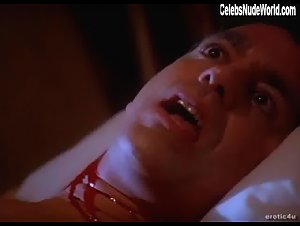 Pamela Anderson Gore , Blonde in Snapdragon (1993) 12