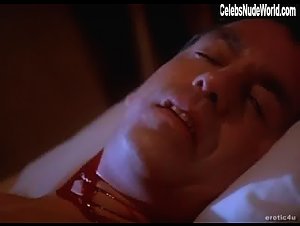 Pamela Anderson Gore , Blonde in Snapdragon (1993) 13