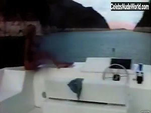 Pamela Anderson relaxing topless in a boat in Pam & Tommy Lee sex tape (1998) 14