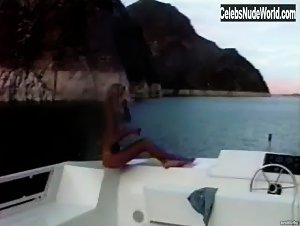 Pamela Anderson relaxing topless in a boat in Pam & Tommy Lee sex tape (1998) 15