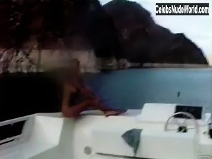 Pamela Anderson relaxing topless in a boat in Pam & Tommy Lee sex tape (1998) 18