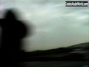 Pamela Anderson blowjob in the car while driving in Pam & Tommy Lee sex tape (1998) 13