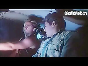Dona Speir Blonde , boobs scene in Do or Die (1991) 11