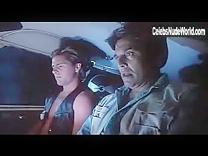 Dona Speir Blonde , boobs scene in Do or Die (1991) 4