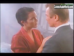 Elizabeth Gracen Flashing , boobs in Discretion Assured (1993) 15