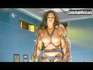 Julie Strain boobs , Costume in How to Make a Monster (2001) 12