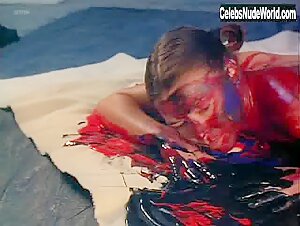 Kari Wuhrer nude, boobs scene in Vivid (1997) 15