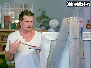 Kari Wuhrer nude, boobs scene in Vivid (1997) 17