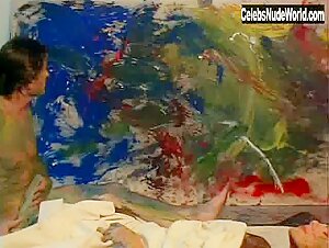 Kari Wuhrer nude, boobs scene in Vivid (1997) 7