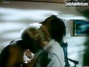 Kelly McGillis boobs , Blonde in Cat Chaser (1989) 2