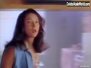 Kelly Preston in Double Cross (1994) 18