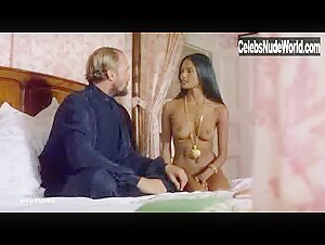 Laura Gemser boobs , Vinatge in Emanuelle in America (1977) 13
