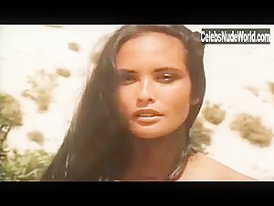 Laura Gemser Outdoor , boobs in La belva dalla calda pelle (1982) 13