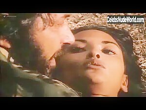 Laura Gemser Outdoor , boobs in La belva dalla calda pelle (1982) 19