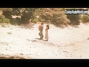 Laura Gemser Outdoor , boobs in La belva dalla calda pelle (1982) 9