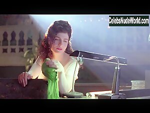 Mia Kirshner Flasing  , Butt scene in Exotica (1994) 17