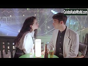 Mia Kirshner Flasing  , Butt scene in Exotica (1994) 9