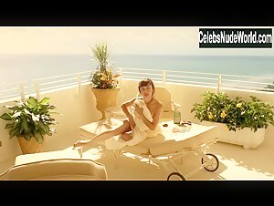 Olga Kurylenko in Magic City (series) (2012)